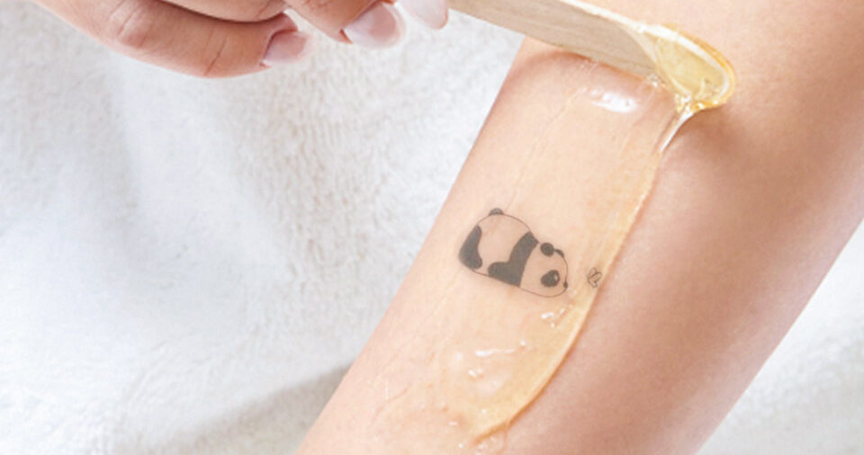 Can you wax over a tattoo