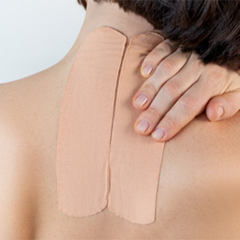 Skin color adhesive bandage