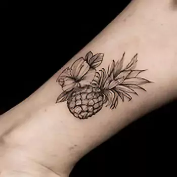 Pineapple wearing flowers