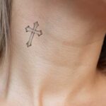 What does the cross tattoo mean
