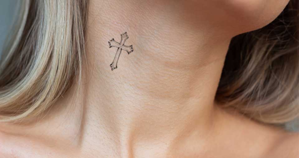 What does the cross tattoo mean