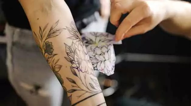 Removing tattoo stencil after getting a tattoo