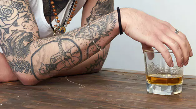 What happen drinking after getting a tattoo
