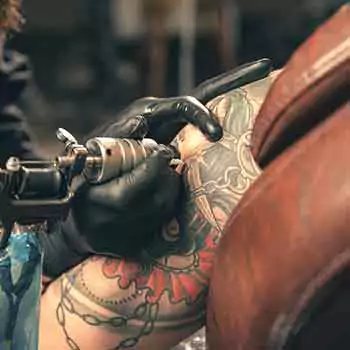 Adding color to an existing black tattoo