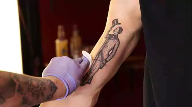 Finishing a tattoo the next day