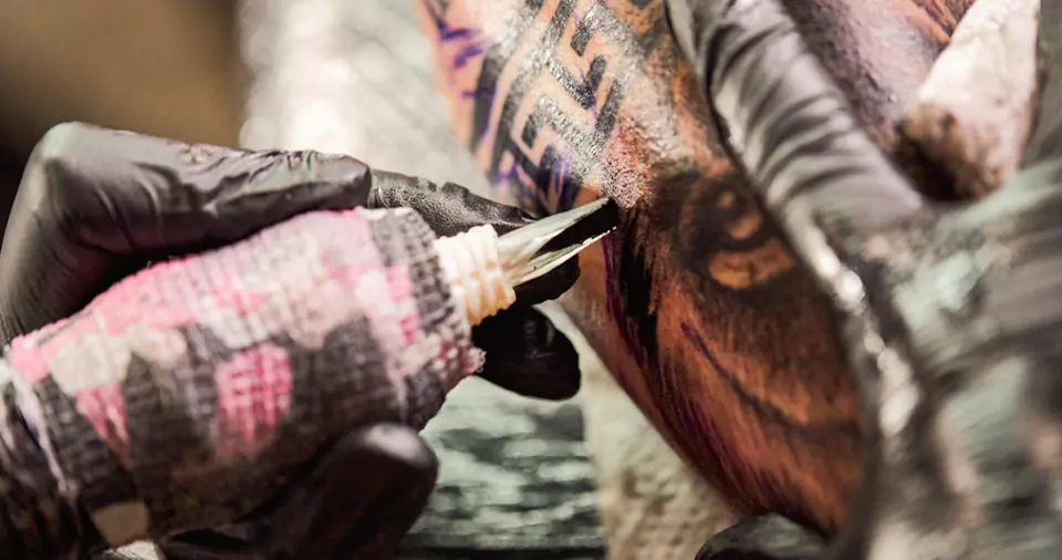 How deep should a tattoo needle go