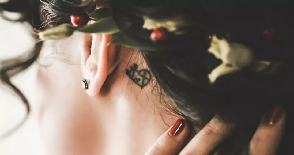 Are behind the ear tattoos painful