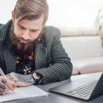 Can real estate agents have tattoos