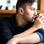 Can you drink coffee before a tattoo