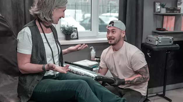 Factors-to-consider-when-getting-a-tap-out-tattoo-session