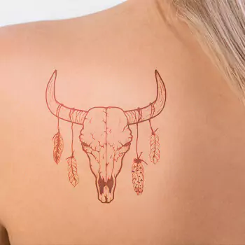 Bull skull tattoo with feathers neck and forearm