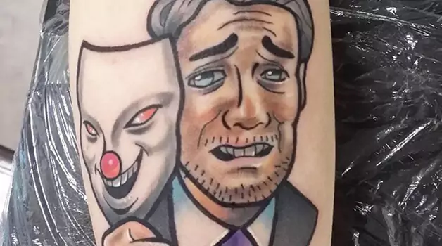 Face-behind-the-mask-laugh-now-cry-later-tattoo