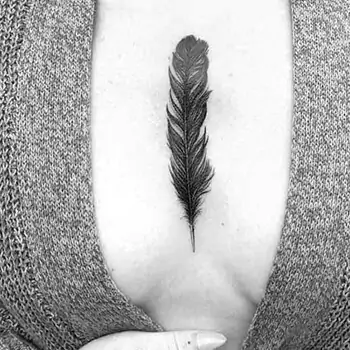 Feathered sternum tattoo