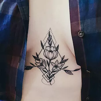 Floral sternum tattoo