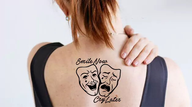 Separated-laugh-now-cry-later-tattoo