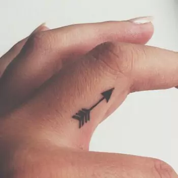 Arrow finger tattoo