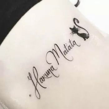 Classic lettering Hakuna Matata tattoo