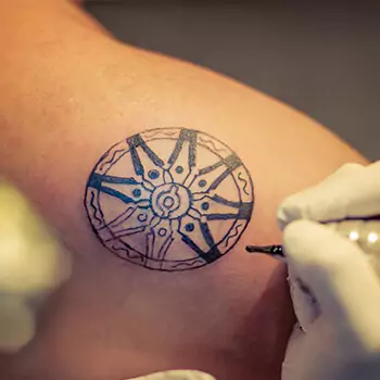 Compass back shoulder tattoo