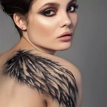 Feather back shoulder tattoo