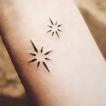 Geometric north star mandala tattoo