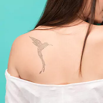 Hummingbird back shoulder tattoo