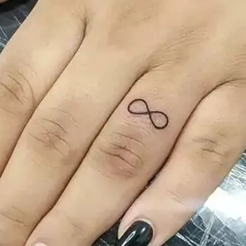 Infinity finger tattoo