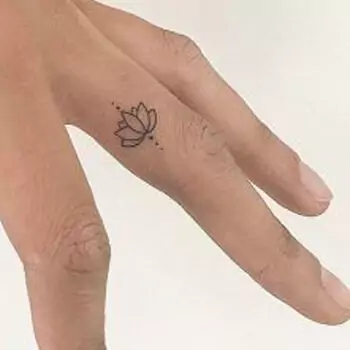 Lotus finger tattoo