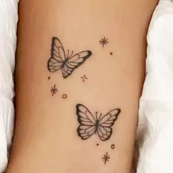  North star with butterfly tattoo
