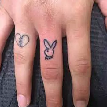 Playboy bunny finger, wrist, and ankle tattoo