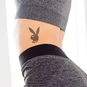 Playboy bunny hip tattoo