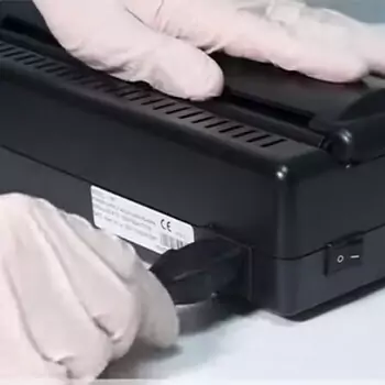 Plug in the tattoo stencil machine