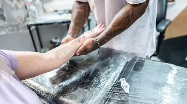 Removing tegaderm from tattoo: Step-by-step guide