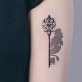 Rooster and key tattoo
