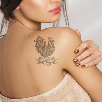 Rooster and quote tattoo