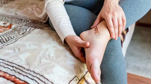 Swelling of ankle tattoo