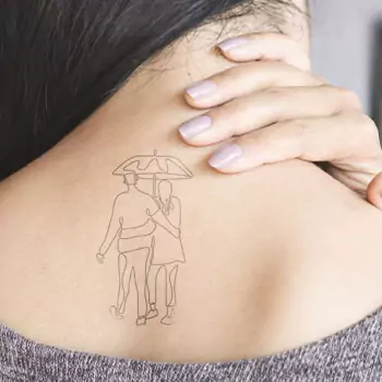 Traveler with umbrella tattoo