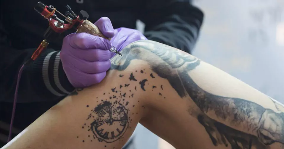 Above The Knee Tattoo