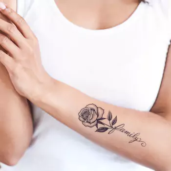 Black rose tattoo with name