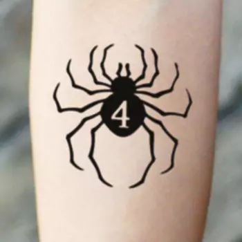 Black spider with a number on it