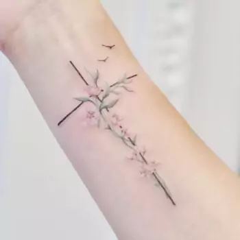 Cross Tattoo With A Rose On The Wrist