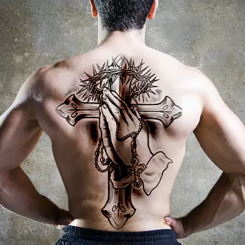 Cross and hand Chicano Mexican tattoo