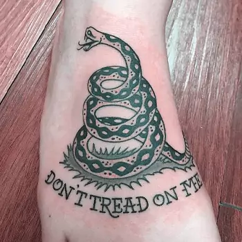 Don’t tread on me with the snake tattoo