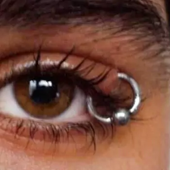 Eyelid piercing