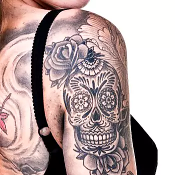 Flower with skull tattoo