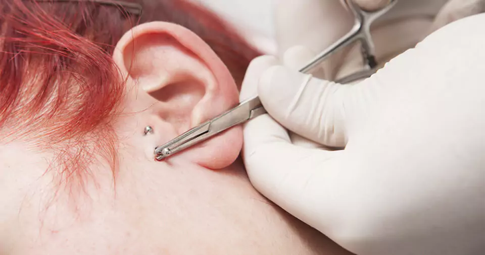 How to take out a tragus piercing