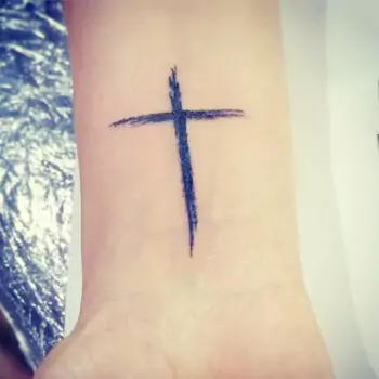Minimalist Cross Tattoo