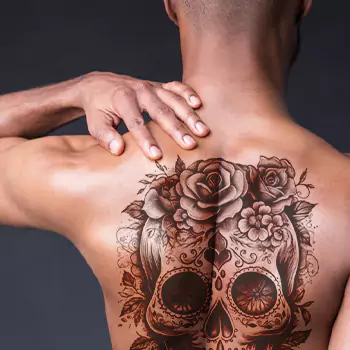 Skull And Flower Chicano Mexican Tattoos