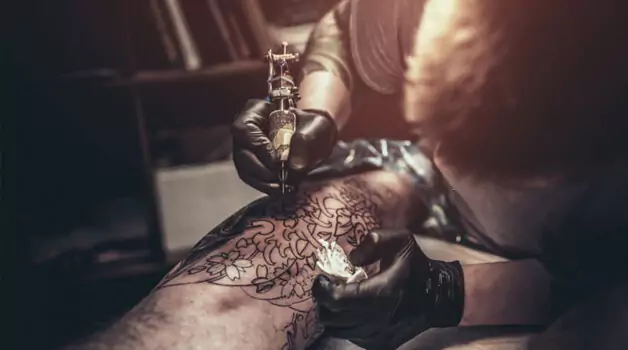 Ways to reduce knee cap tattoo pain