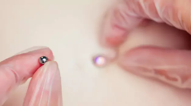 When to change your belly piercing
