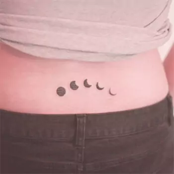 crescent-moon-tramp-stamp-tattoo